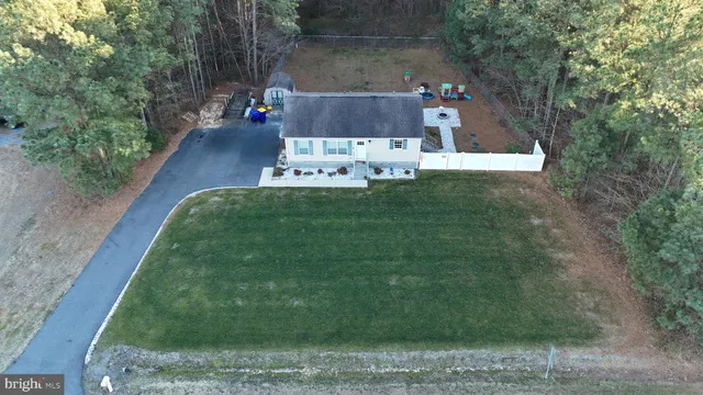 a view of a garden with a bench