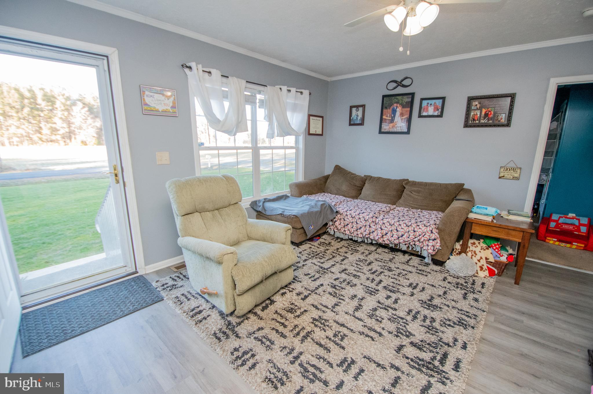 5284 White Deer Road Delmar, DE 19940 - Photo 5 of 14 a living room with furniture and a window