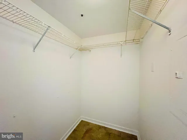 a view of a room with racks on the wall