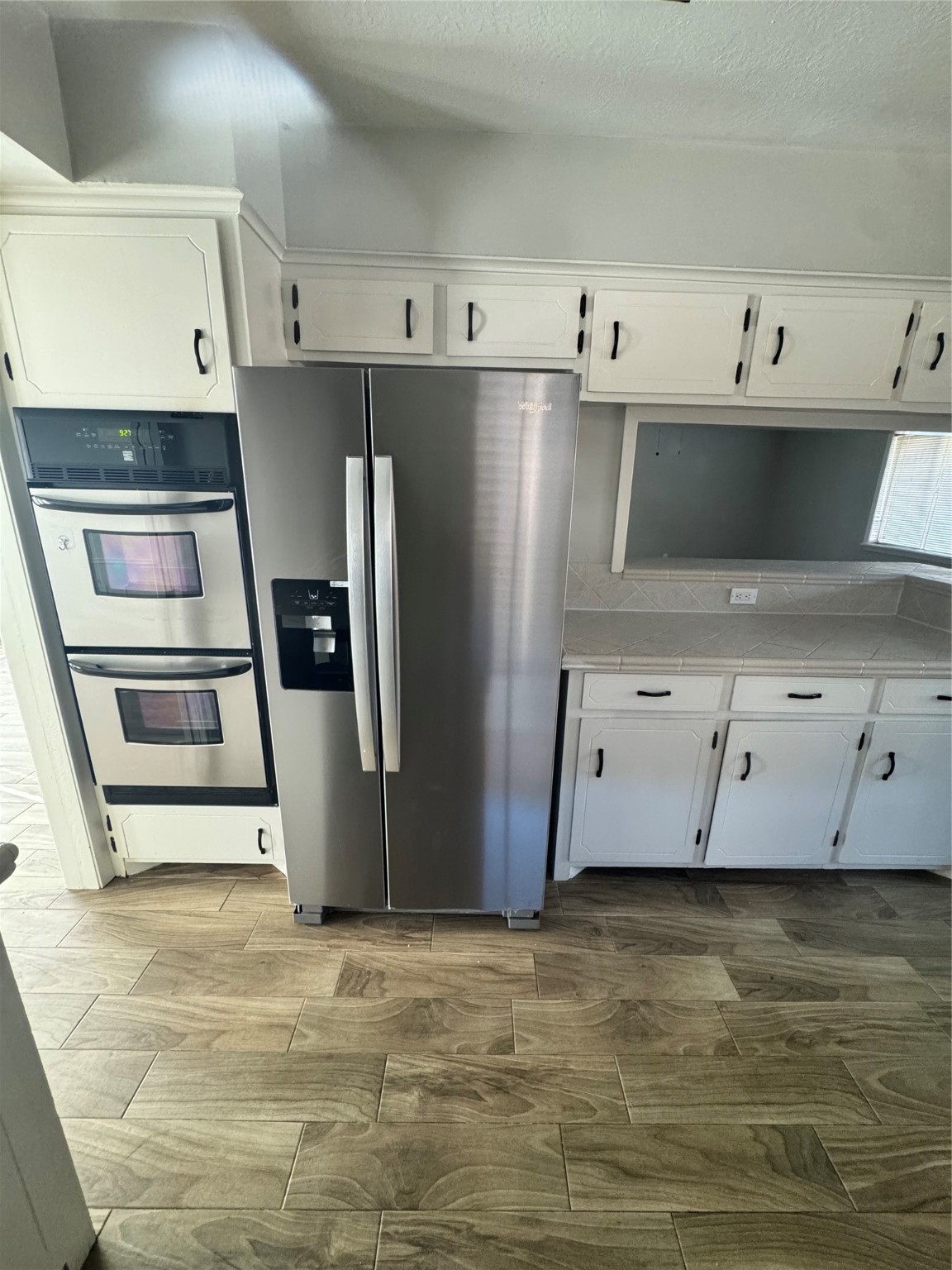 1715 Capstan Road Houston, TX 77062 - Photo 13 of 40 a kitchen with stainless steel appliances a refrigerator and a sink