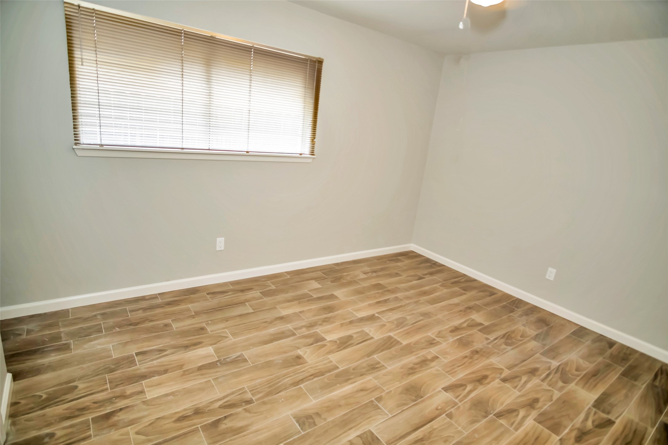 1715 Capstan Road Houston, TX 77062 - Photo 18 of 40 a view of empty room with wooden floor