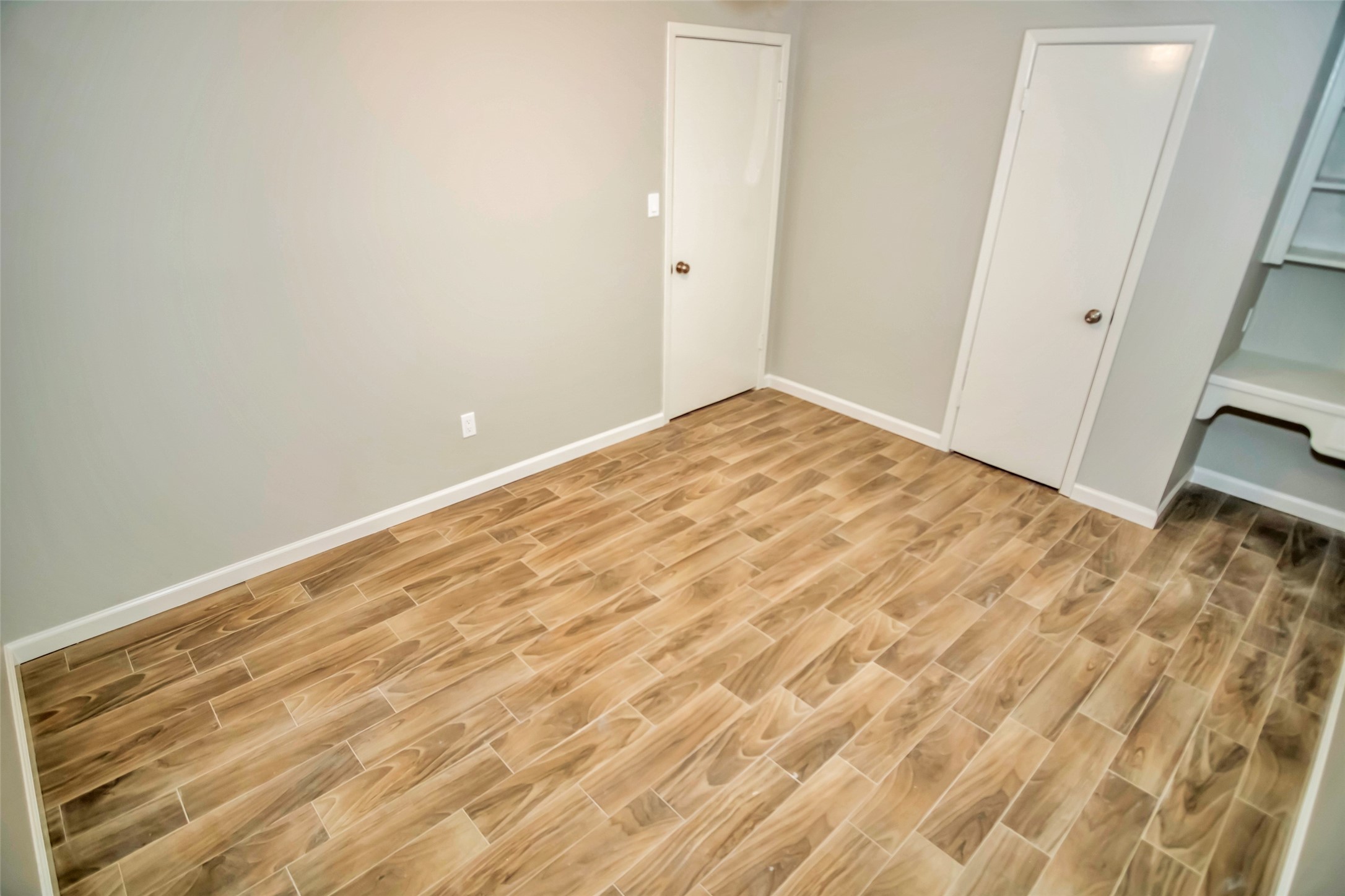 1715 Capstan Road Houston, TX 77062 - Photo 24 of 40 a view of empty room with wooden floor