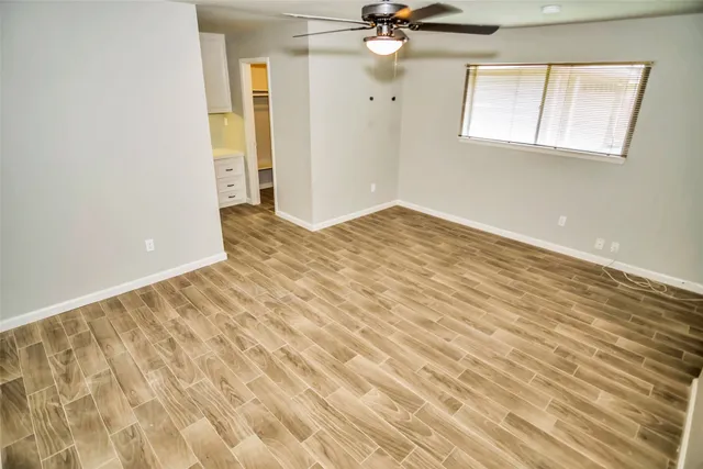 a view of an empty room and window