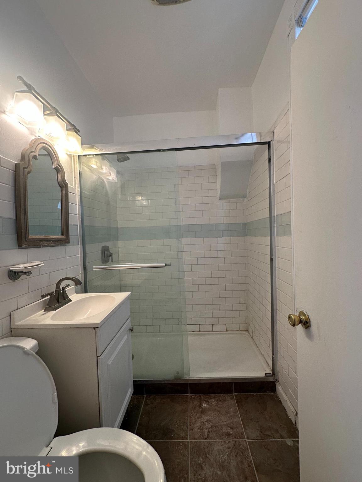 3843 Baring Street Philadelphia, PA 19104 - Photo 11 of 30 a bathroom with a sink toilet and shower
