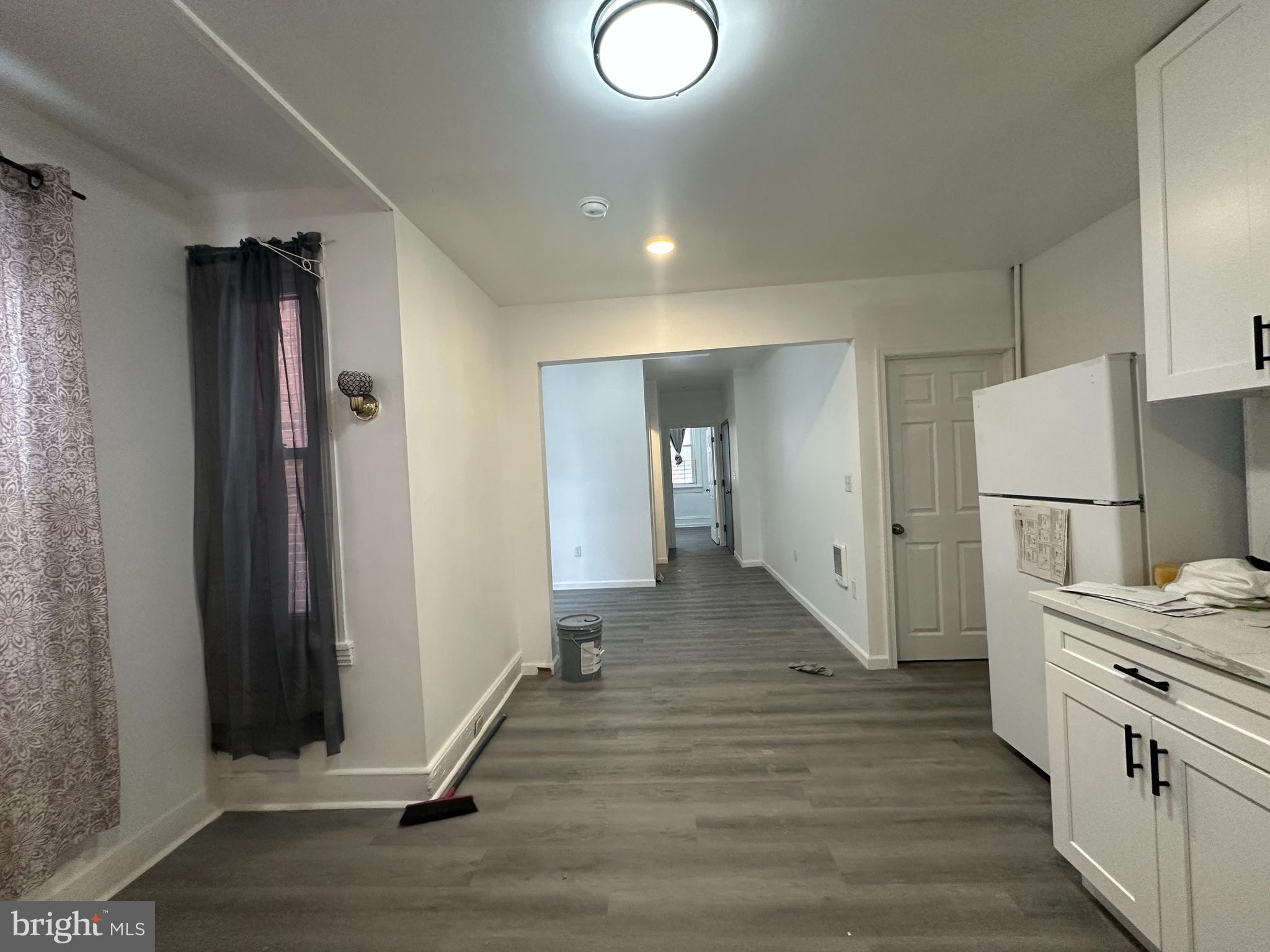 3843 Baring Street Philadelphia, PA 19104 - Photo 15 of 30 a view of a kitchen from the hallway