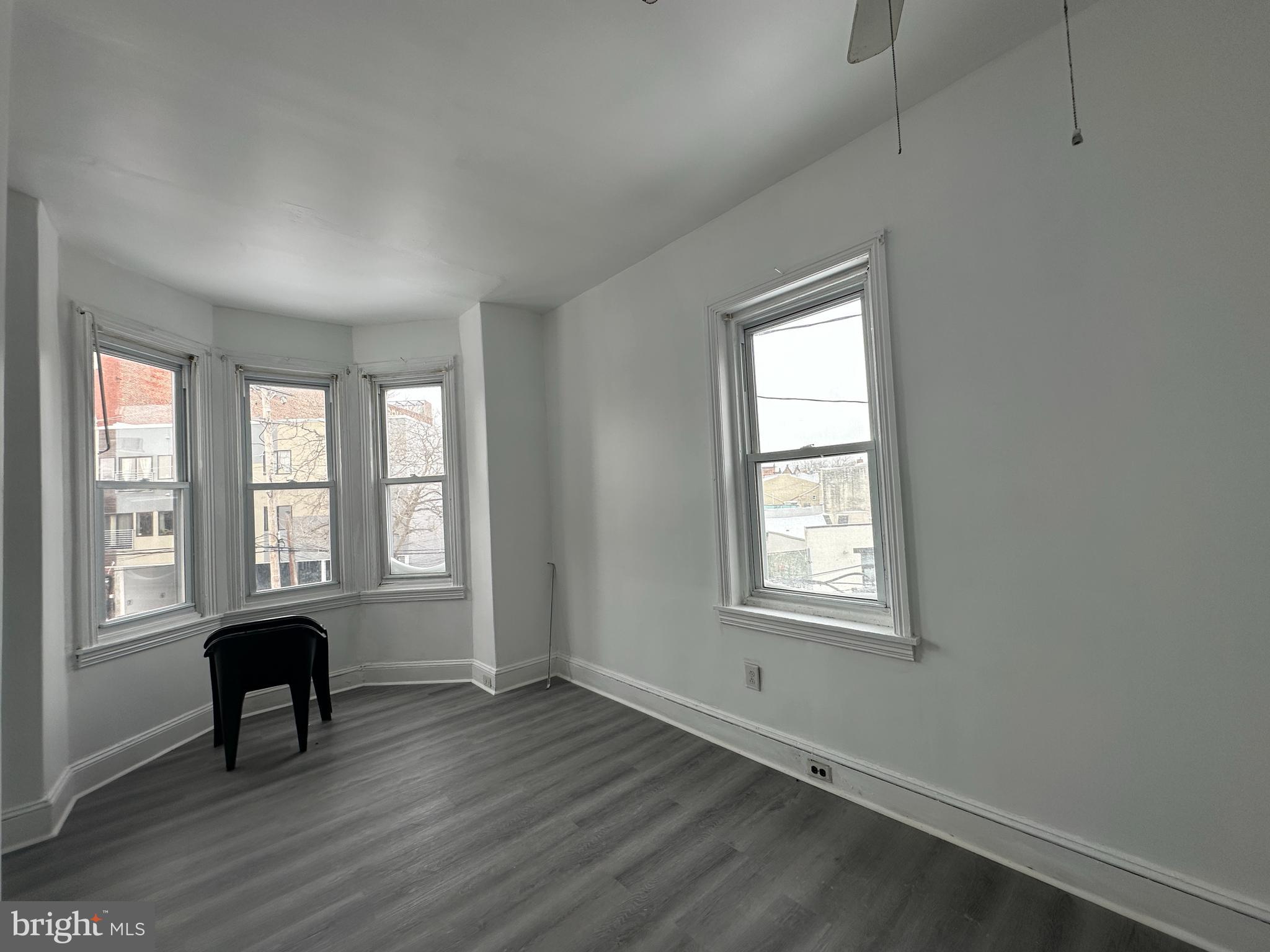 3843 Baring Street Philadelphia, PA 19104 - Photo 23 of 30 a view of an empty room with a chair and a window