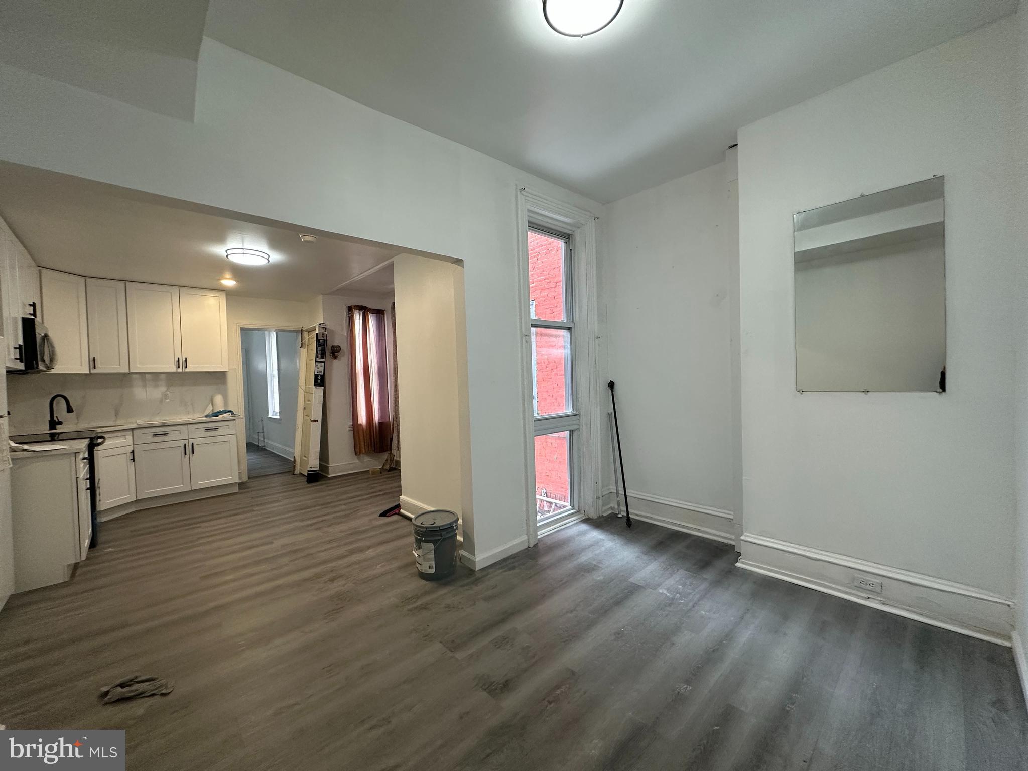 3843 Baring Street Philadelphia, PA 19104 - Photo 9 of 30 a view of a kitchen with a sink and a refrigerator