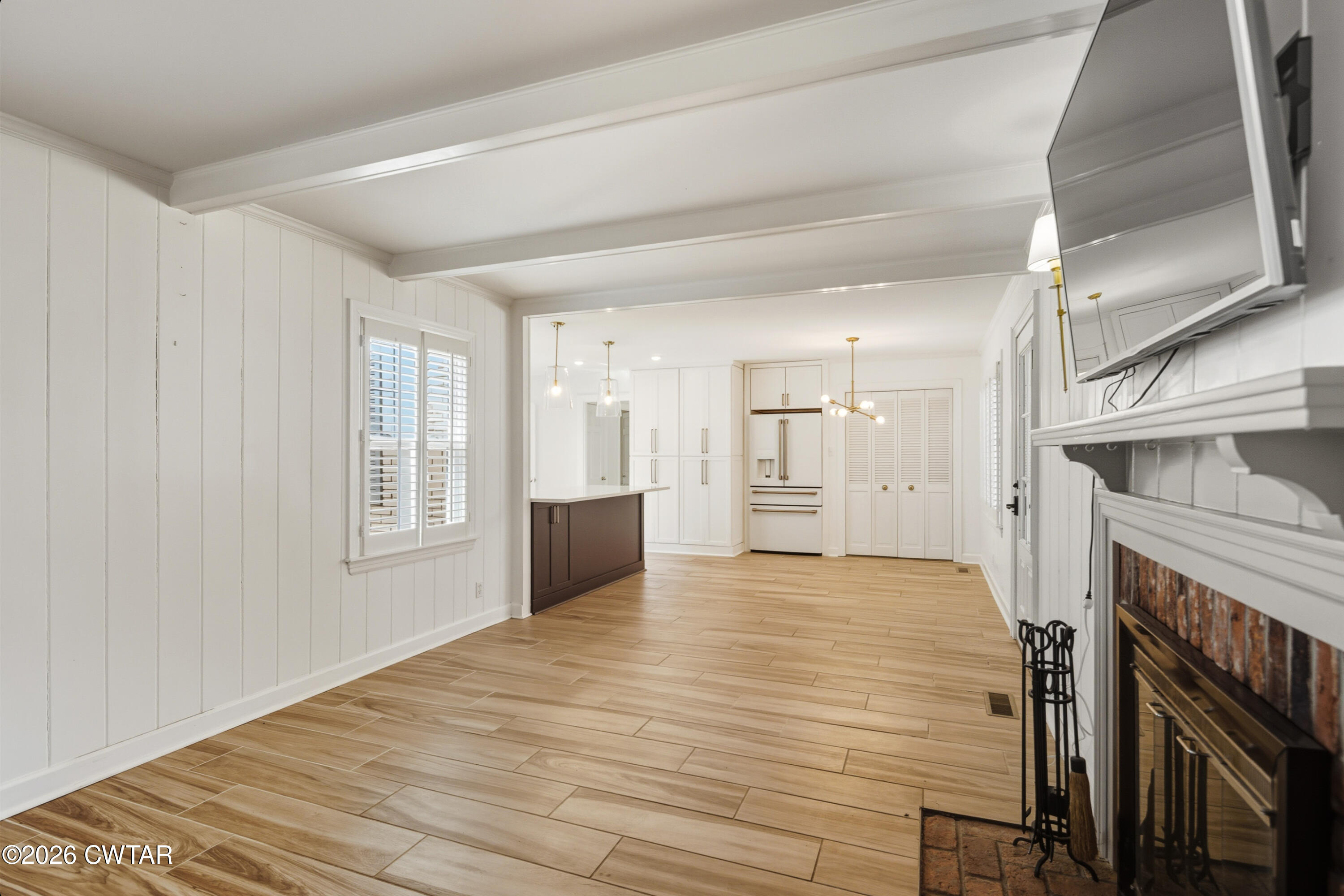 126 Rooks Drive Brownsville, TN 38012 - Photo 23 of 52 a view of livingroom with hardwood floor and window