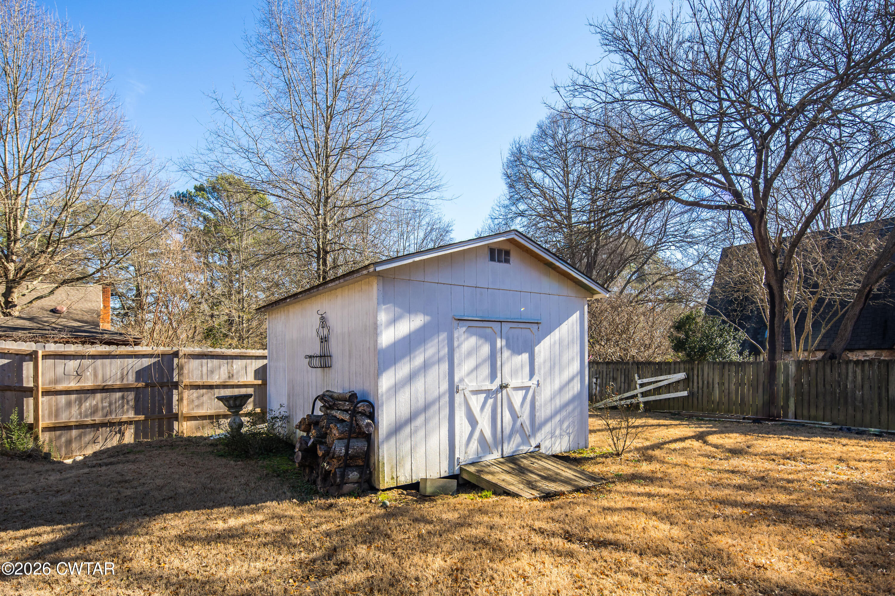 126 Rooks Drive Brownsville, TN 38012 - Photo 44 of 52 a view of a house with a snow in the yard