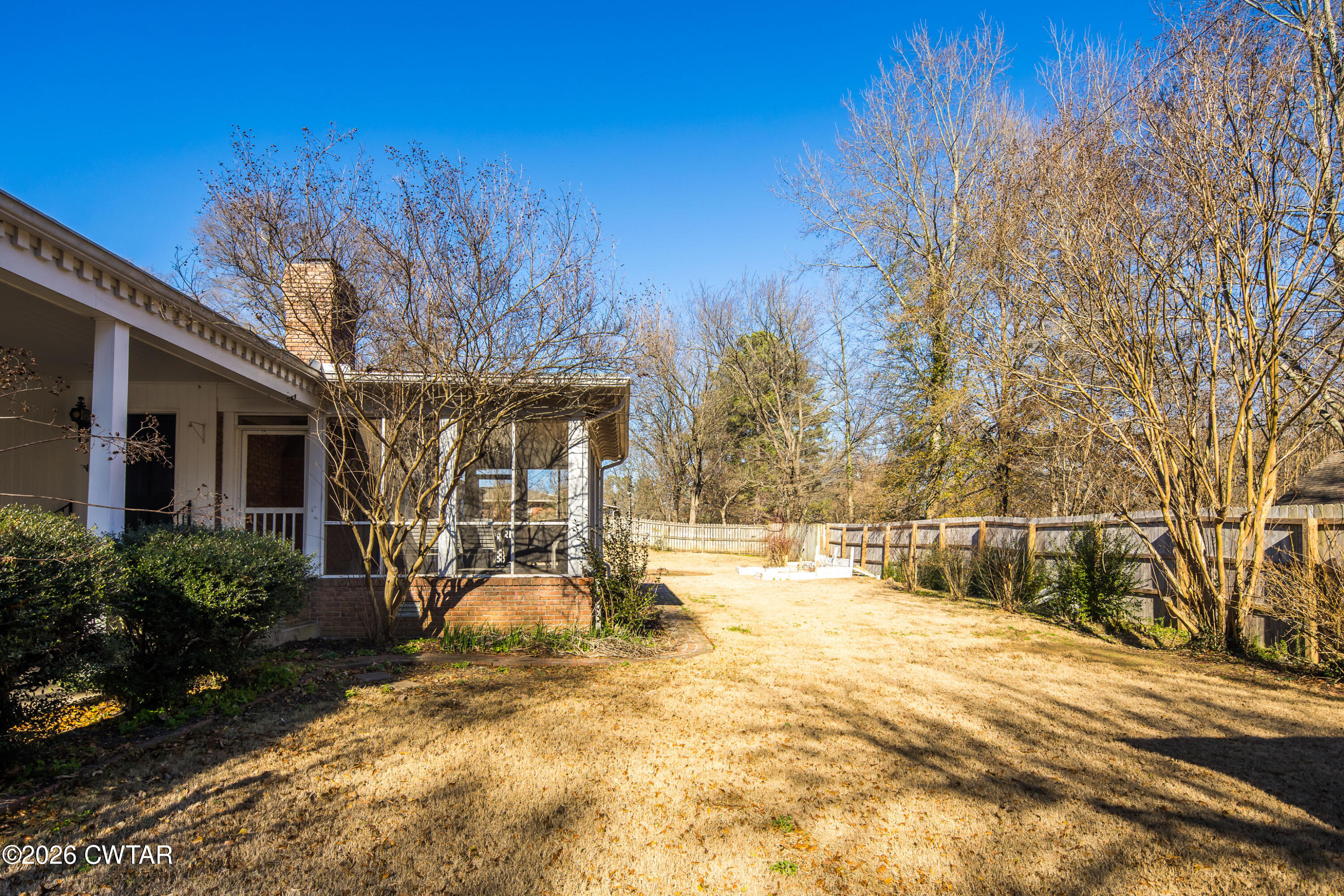126 Rooks Drive Brownsville, TN 38012 - Photo 45 of 52 a view of a house with a yard and tree s