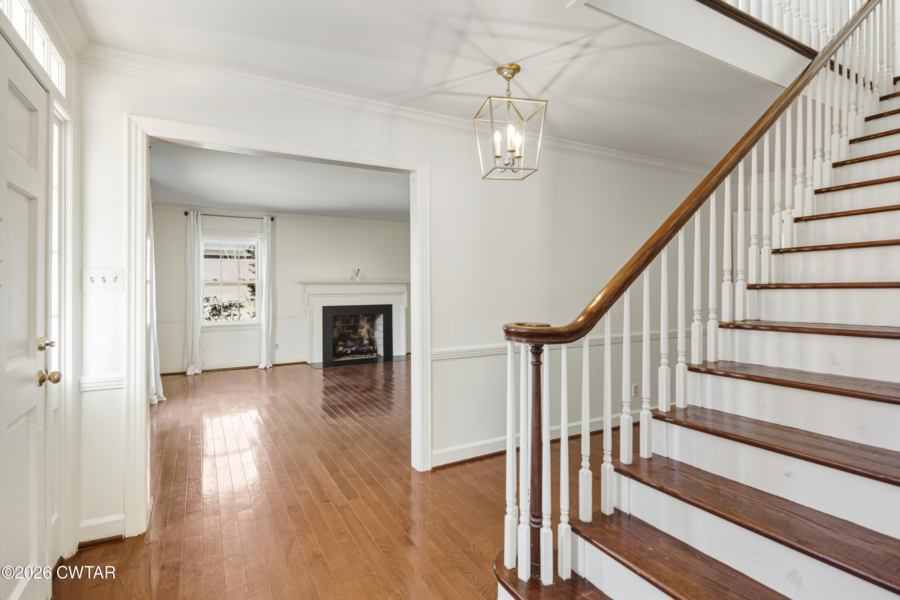 126 Rooks Drive Brownsville, TN 38012 - Photo 9 of 52 a view of a hallway view with wooden floor and staircase