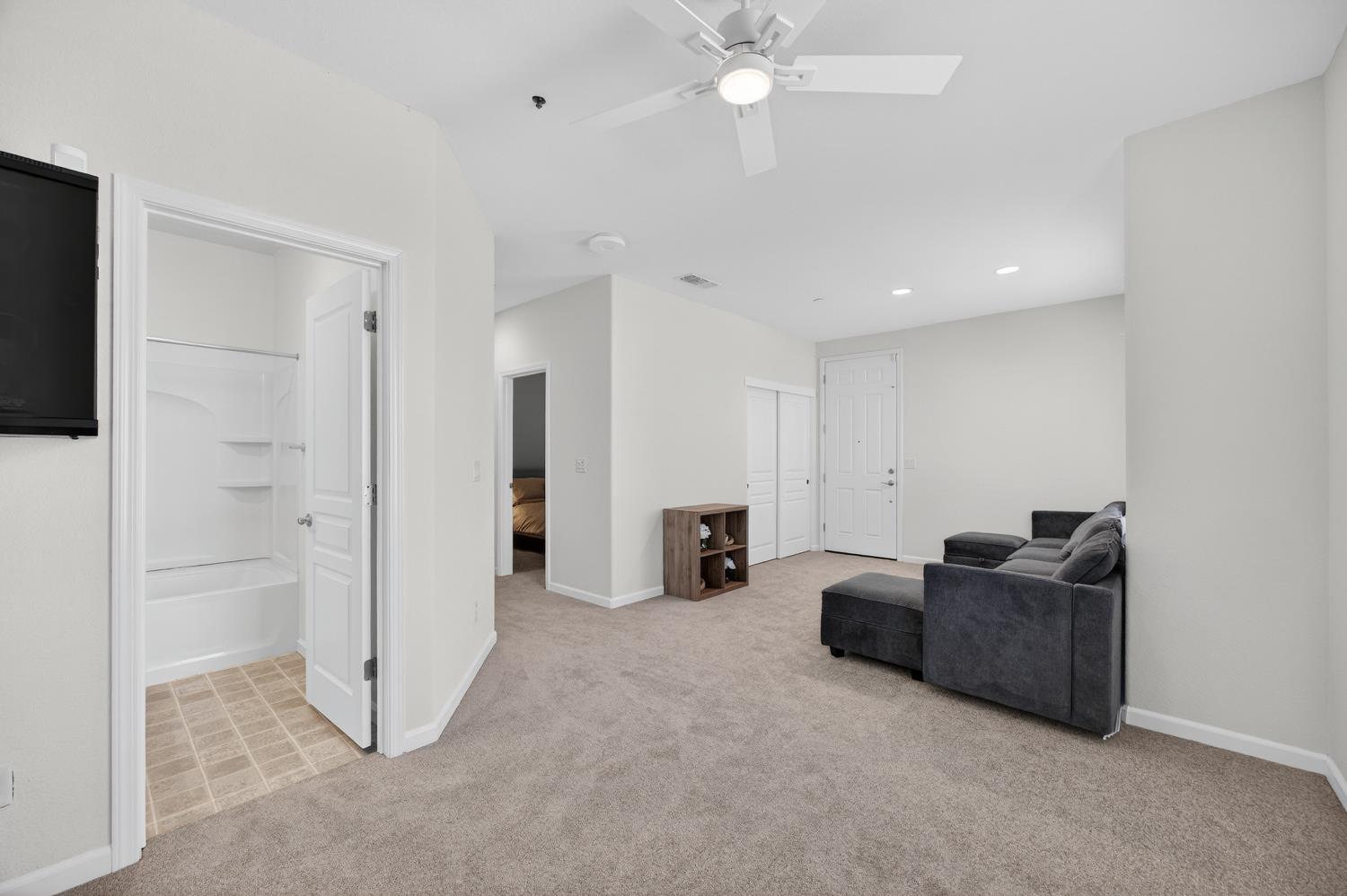 7620 Ferrell Way Elk Grove, CA 95757 - Photo 11 of 75 a living room with furniture and a flat screen tv