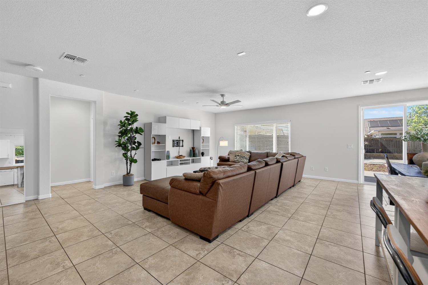 7620 Ferrell Way Elk Grove, CA 95757 - Photo 20 of 75 a living room with furniture and a potted plant