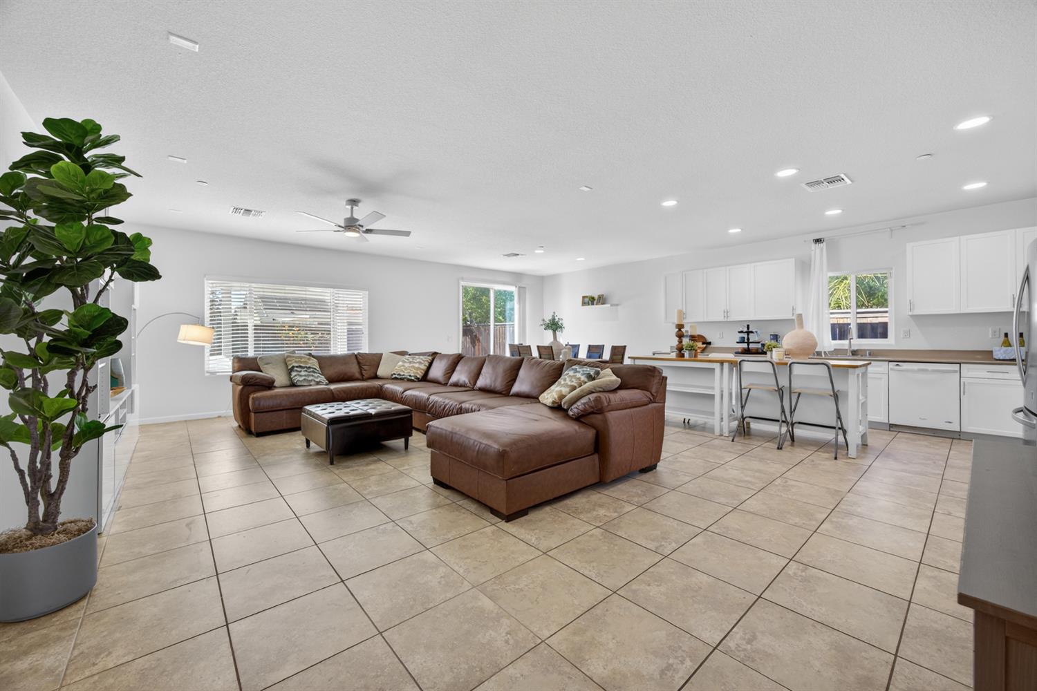 7620 Ferrell Way Elk Grove, CA 95757 - Photo 2 of 75 a living room with furniture and a potted plant