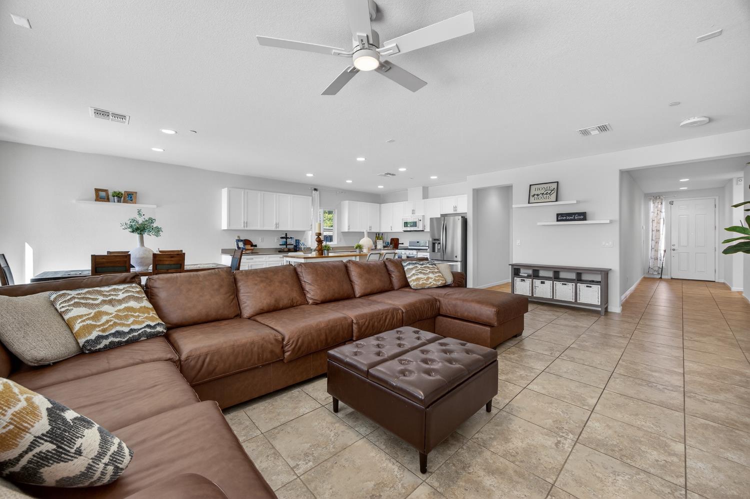 7620 Ferrell Way Elk Grove, CA 95757 - Photo 22 of 75 a living room with furniture and a view of kitchen