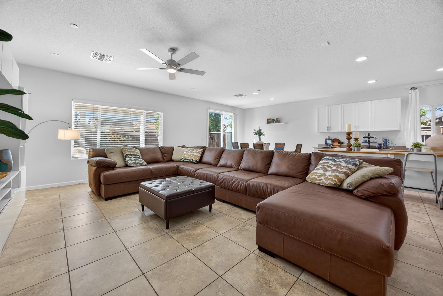 7620 Ferrell Way Elk Grove, CA 95757 - Photo 23 of 75 a living room with a couch and a fireplace