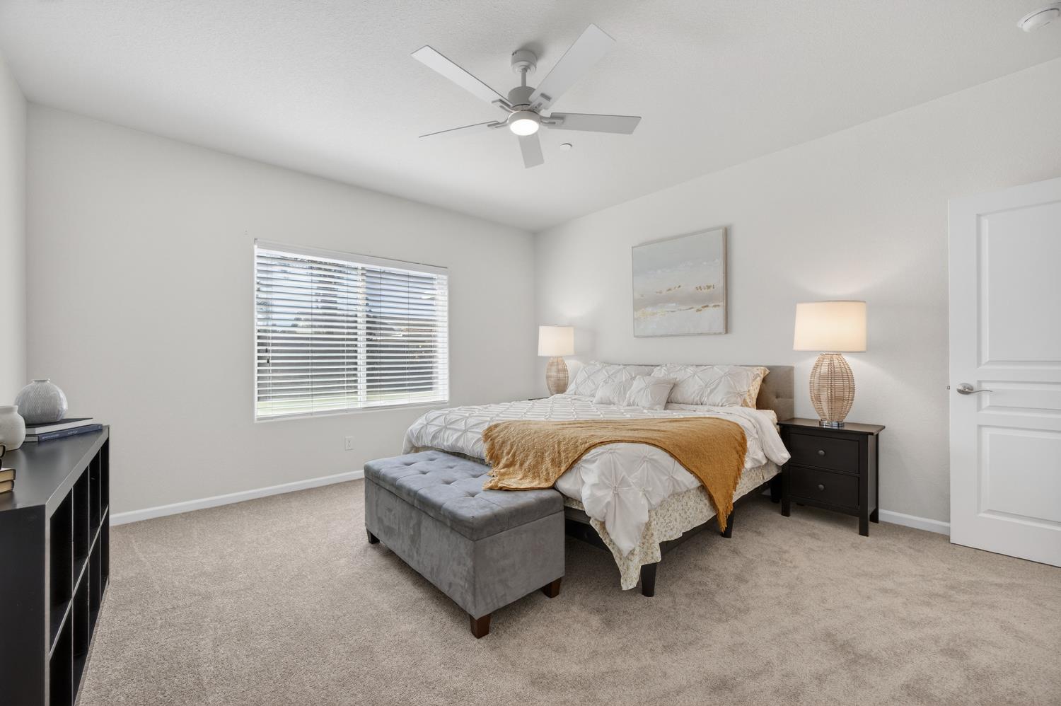 7620 Ferrell Way Elk Grove, CA 95757 - Photo 34 of 75 a spacious bedroom with bed and a window
