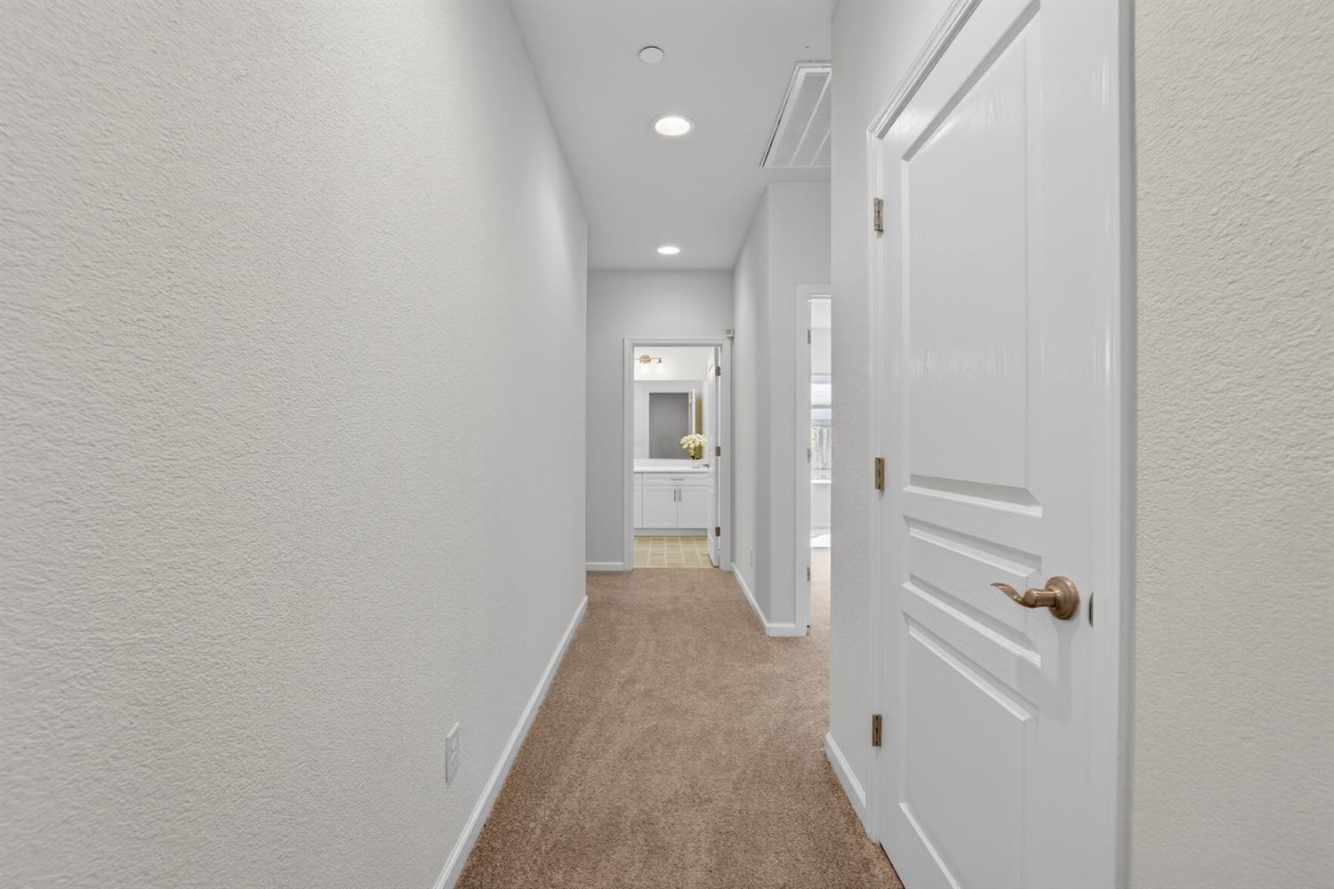 7620 Ferrell Way Elk Grove, CA 95757 - Photo 45 of 75 a view of a hallway with closet and wooden floor