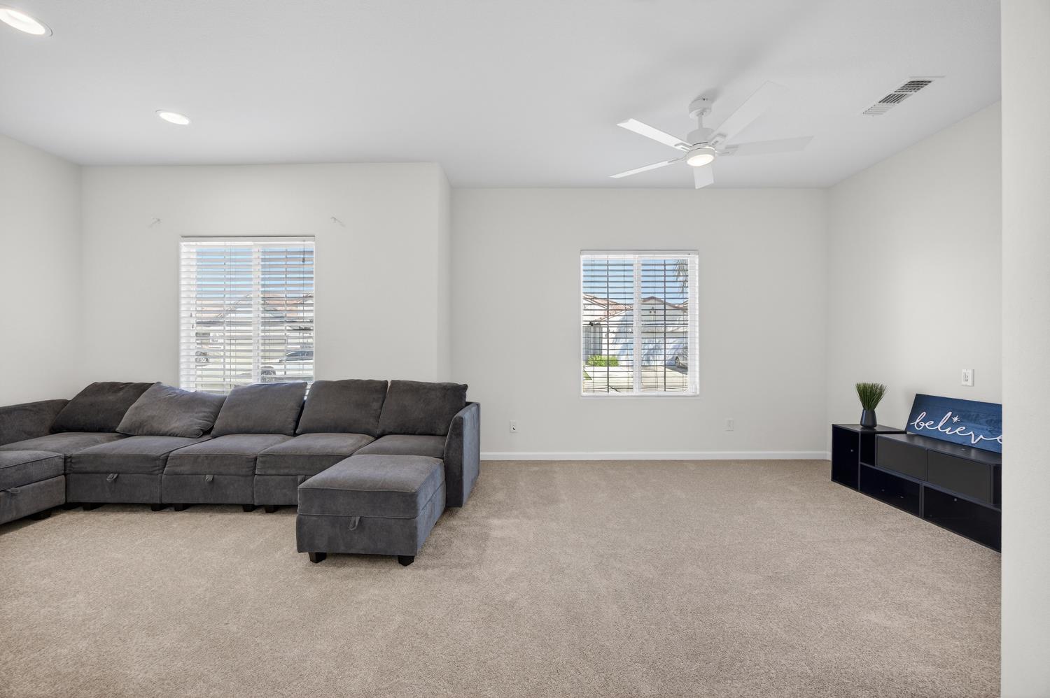 7620 Ferrell Way Elk Grove, CA 95757 - Photo 49 of 75 a living room with furniture and a window
