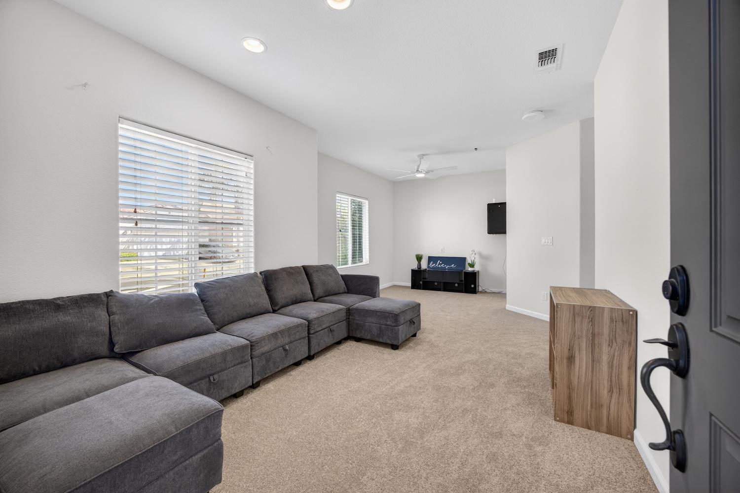 7620 Ferrell Way Elk Grove, CA 95757 - Photo 51 of 75 a living room with furniture and a window