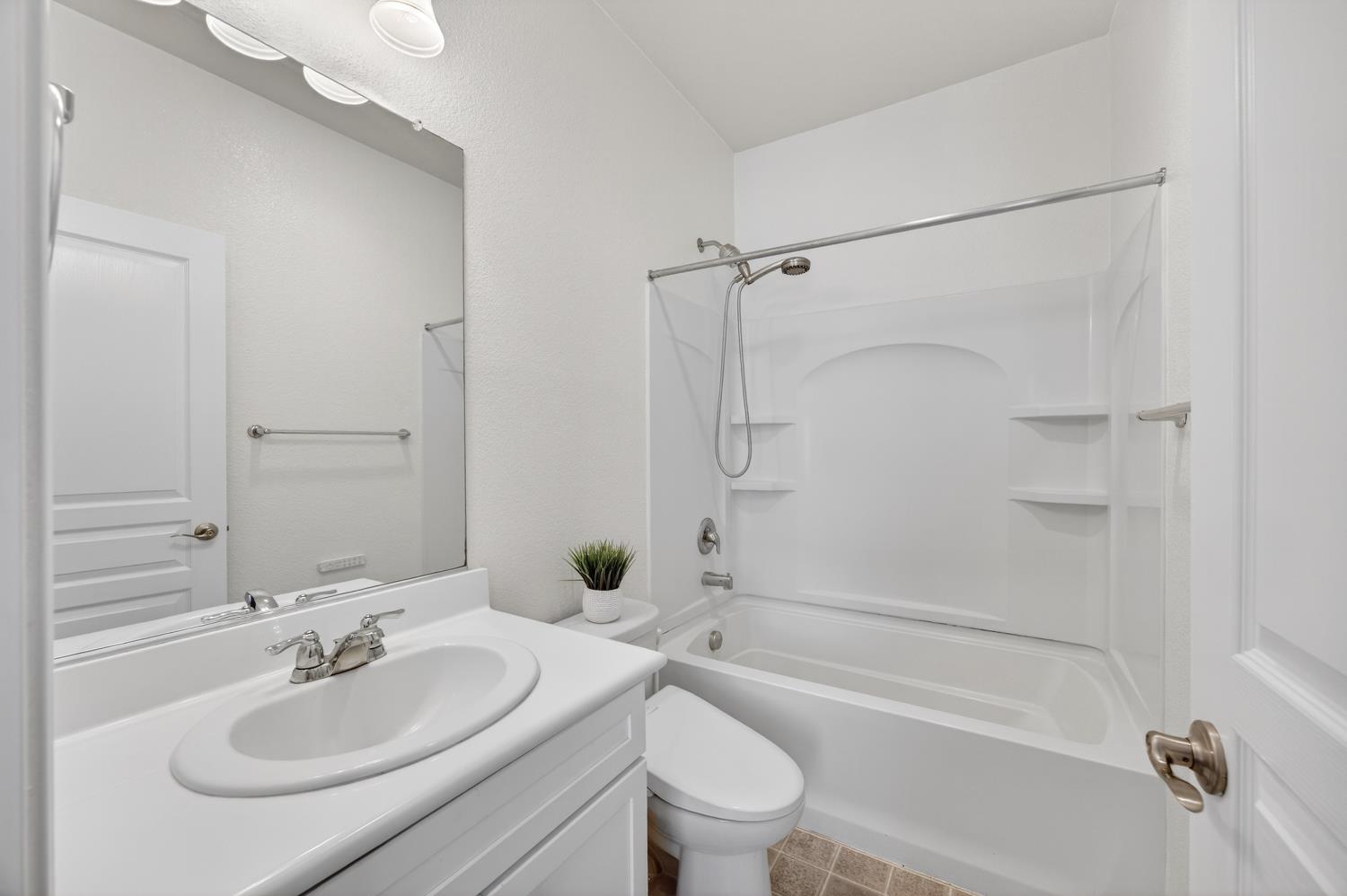 7620 Ferrell Way Elk Grove, CA 95757 - Photo 54 of 75 a bathroom with a sink toilet tub and shower