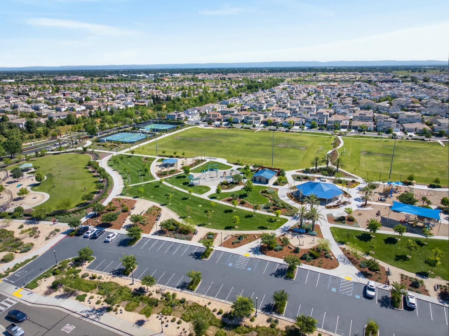 7620 Ferrell Way Elk Grove, CA 95757 - Photo 71 of 75 an aerial view of a houses with a lake view