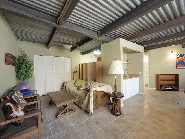 a view of a workspace with furniture