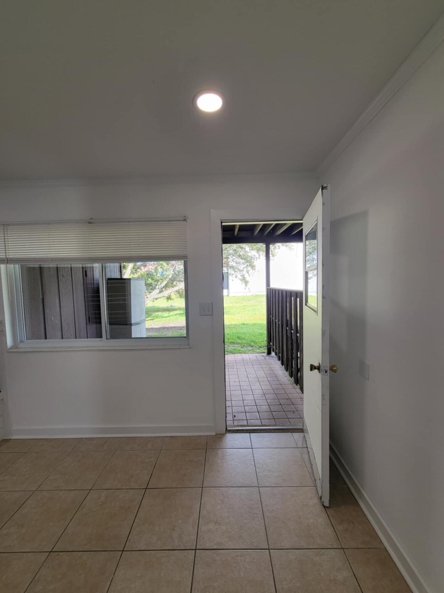 145 4th Avenue, Unit B3 Shalimar, FL 32579 - Photo 23 of 46 a view of an empty room with a window