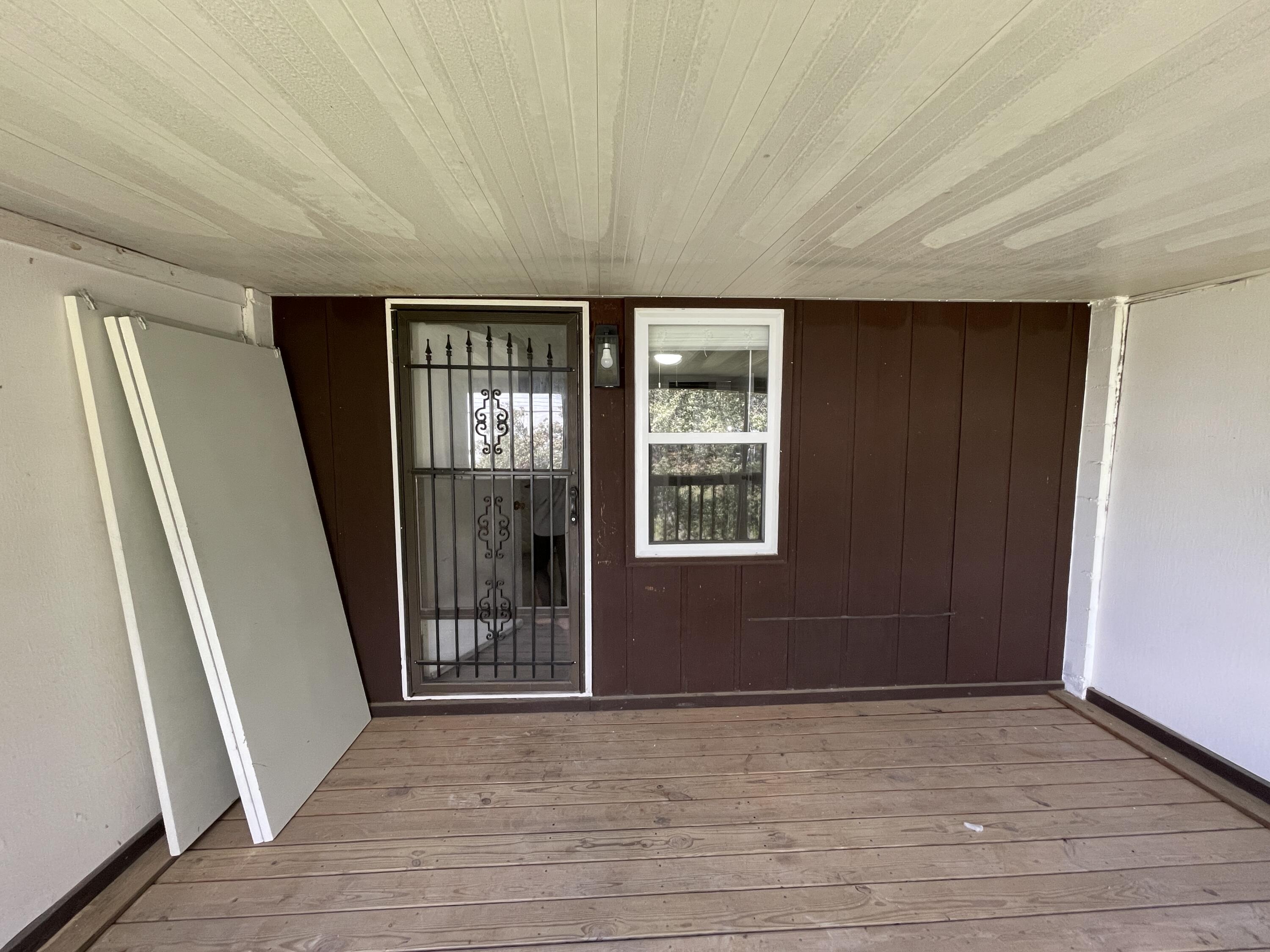 145 4th Avenue, Unit B3 Shalimar, FL 32579 - Photo 31 of 46 an empty room with wooden floor and windows