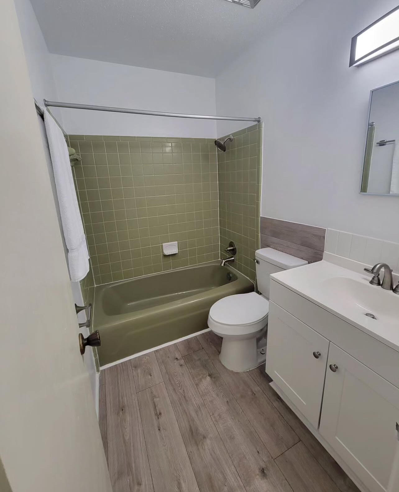 145 4th Avenue, Unit B3 Shalimar, FL 32579 - Photo 36 of 46 a bathroom with a toilet a sink and shower