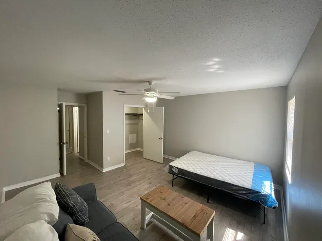 a view of an empty walk in closet