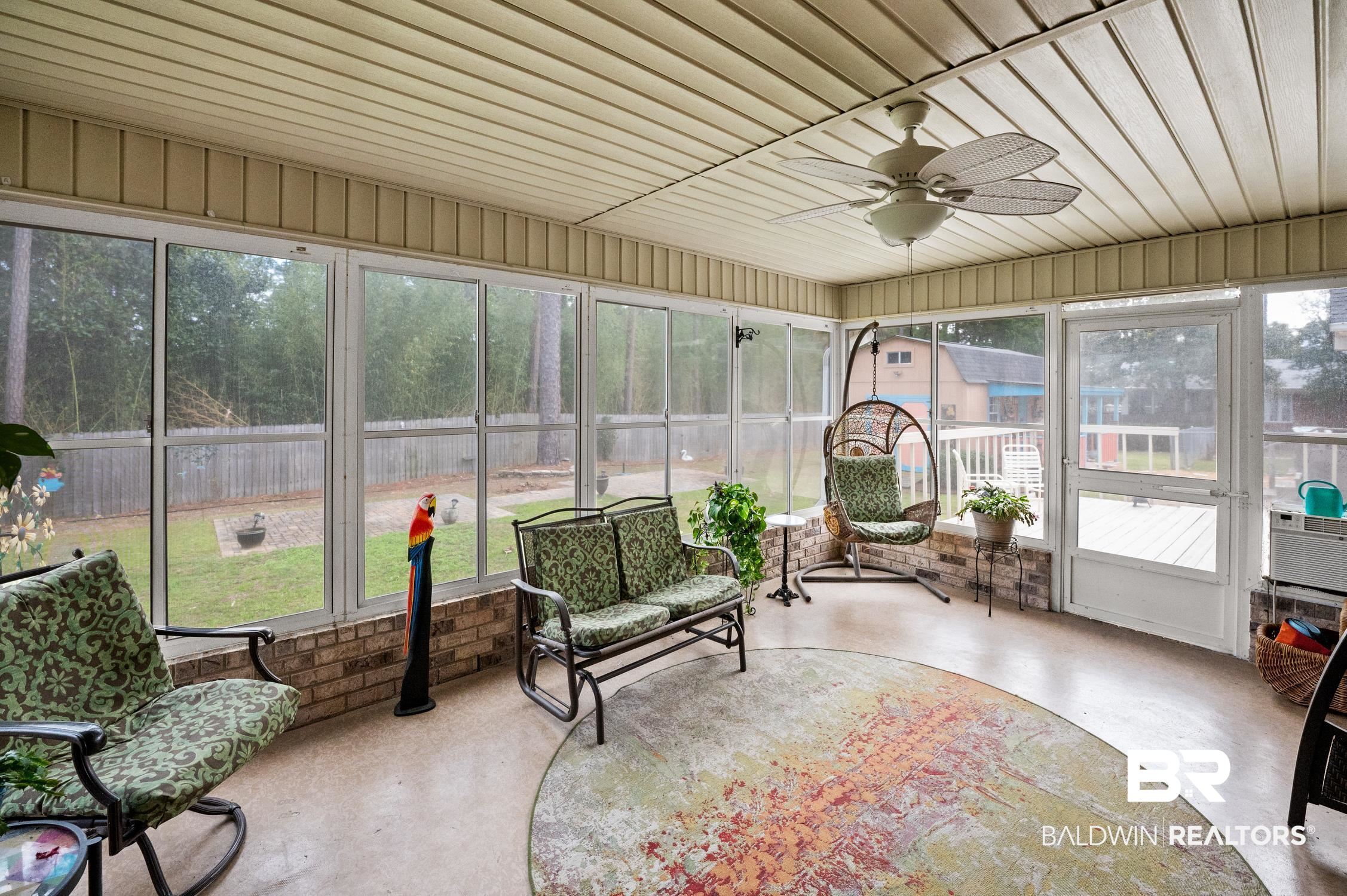 2553 Santa Rosa Drive Lillian, AL 36549 - Photo 36 of 51 Sunroom featuring wood ceiling and ceiling fan