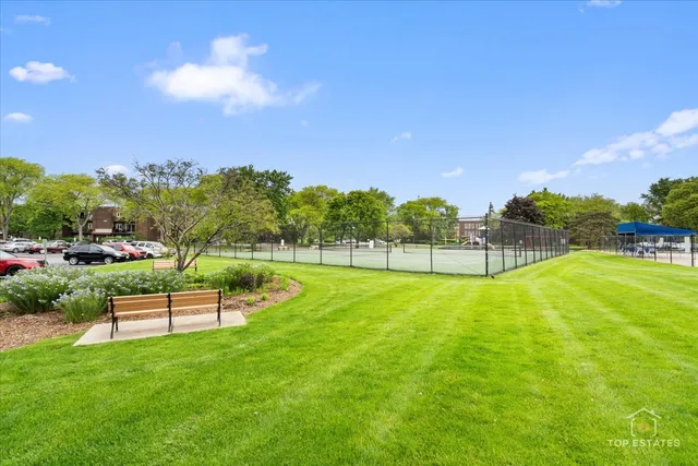 a view of a garden with houses