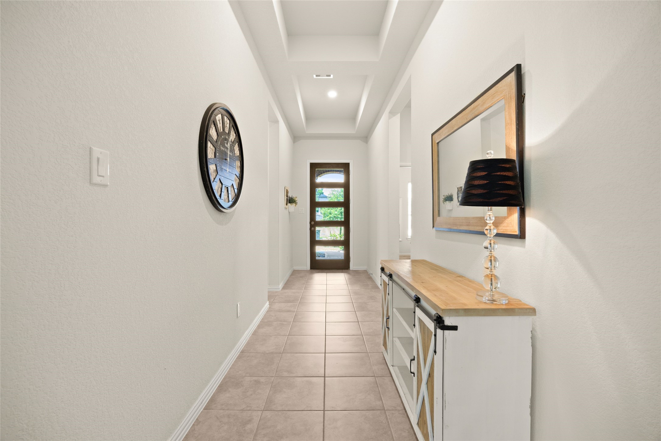 252 Scarlet Maple Way Conroe, TX 77318 - Photo 4 of 37 Tray ceilings along entry hallway