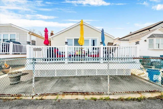 a view of roof deck with patio