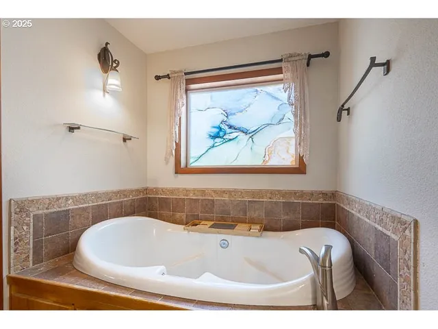 a bathroom with a bathtub