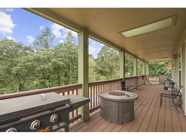 a view of a patio with wooden floor