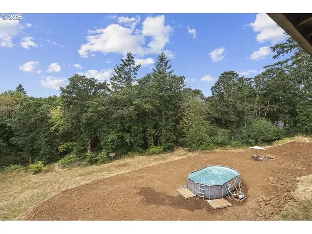 a view of a backyard of a house