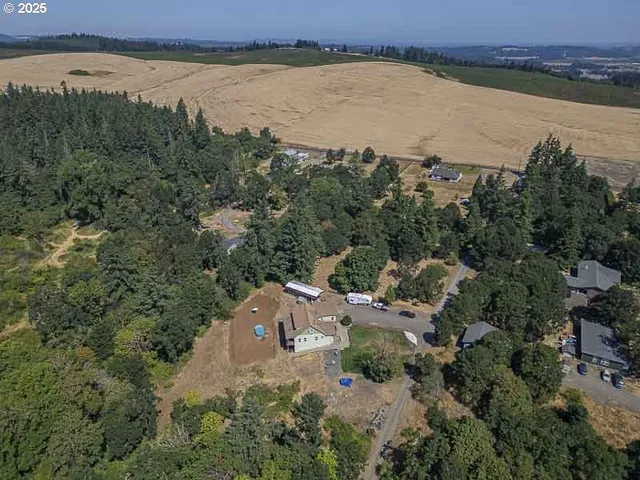 a view of a lake with beach and city view