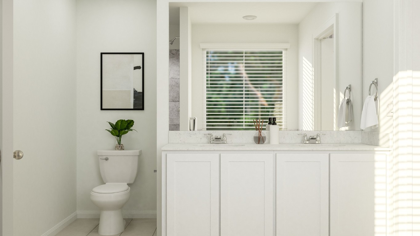 3290 Everett Kyle, TX 78640 - Photo 20 of 20 a bathroom with a toilet a sink and a window