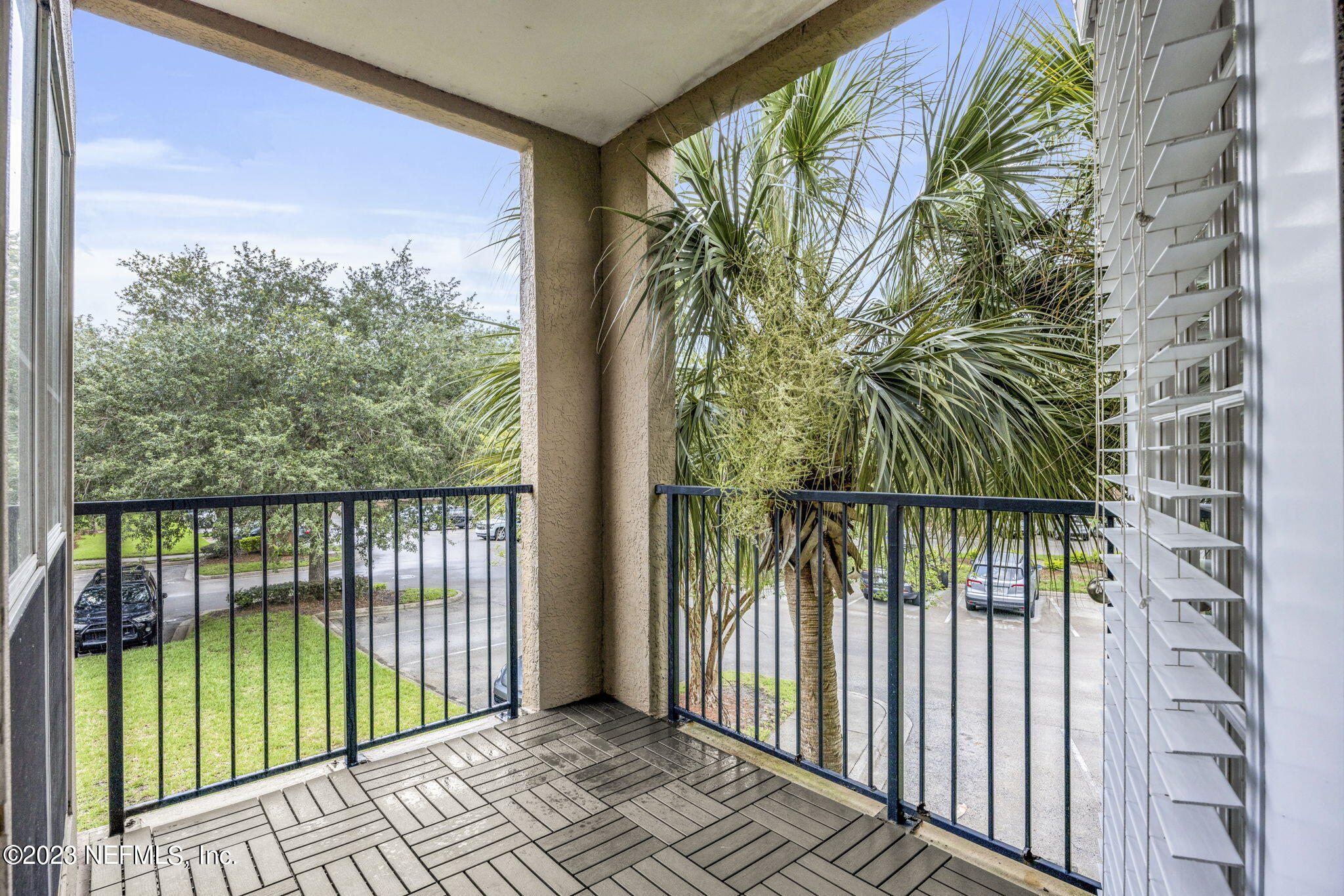 10961 Burnt Mill Road, Unit 427 Jacksonville, FL 32256 - Photo 25 of 50 a view of balcony with a floor to ceiling window