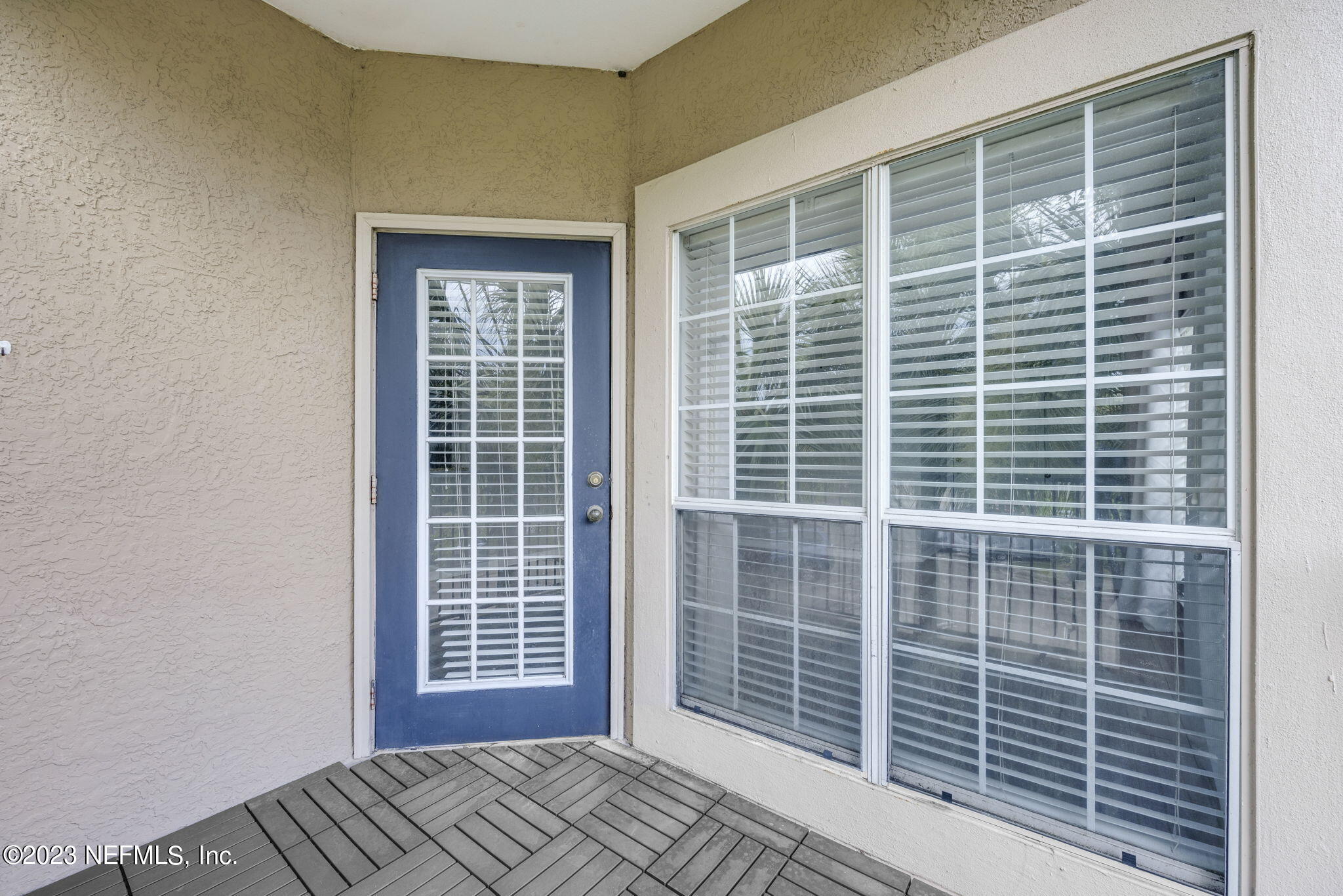 10961 Burnt Mill Road, Unit 427 Jacksonville, FL 32256 - Photo 26 of 50 a view of a balcony with a door