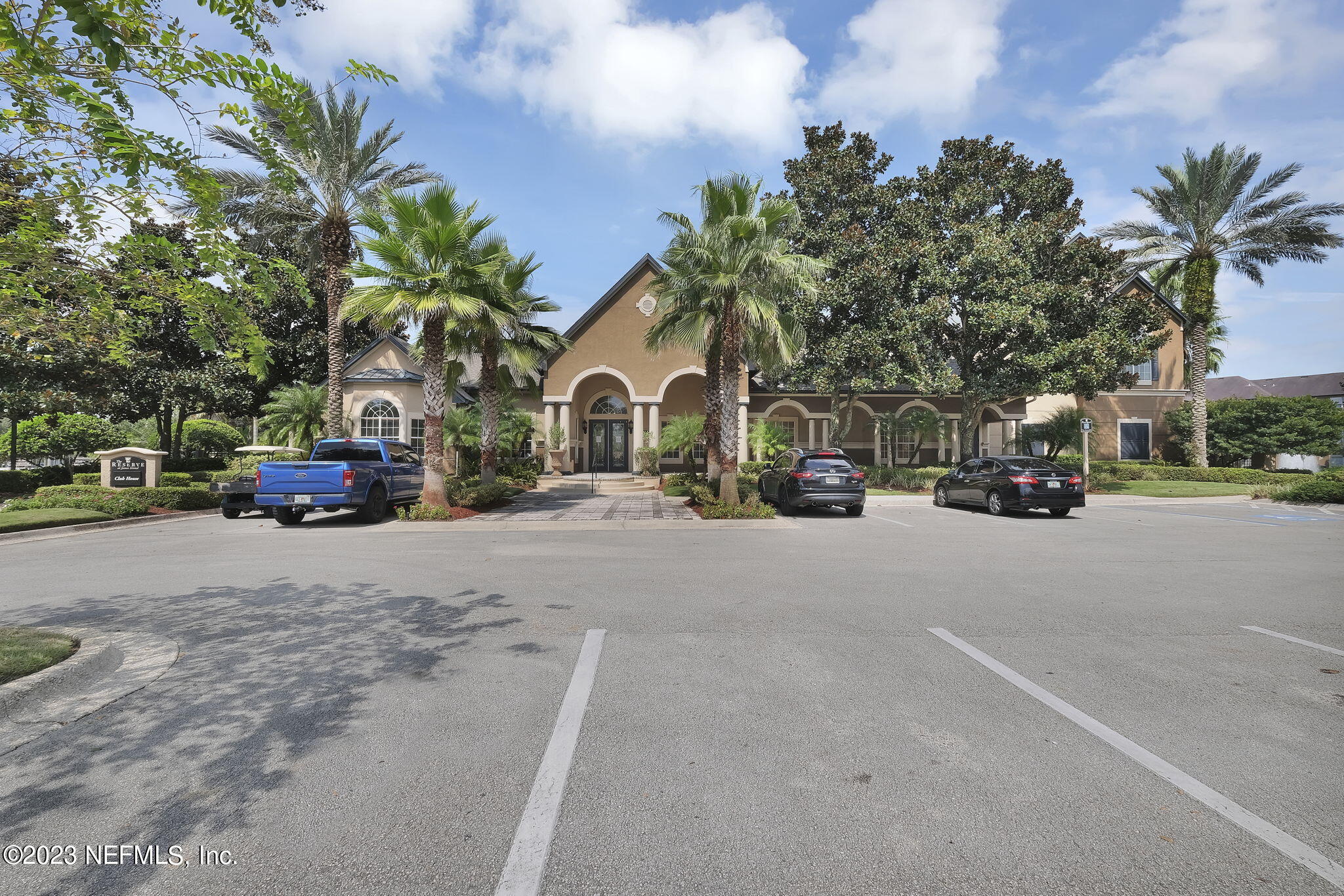 10961 Burnt Mill Road, Unit 427 Jacksonville, FL 32256 - Photo 30 of 50 a cars parked in front of a house