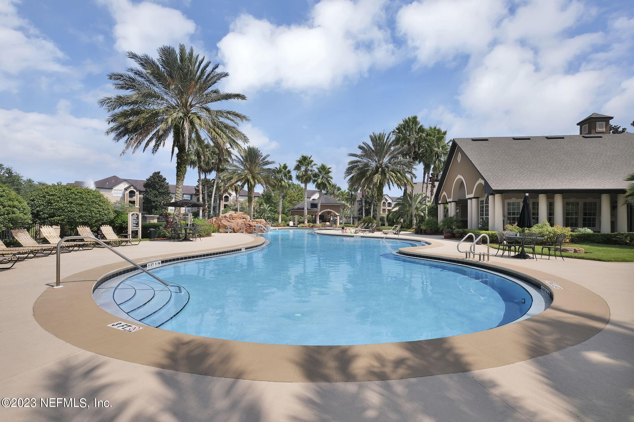 10961 Burnt Mill Road, Unit 427 Jacksonville, FL 32256 - Photo 35 of 50 a view of outdoor space yard and swimming pool