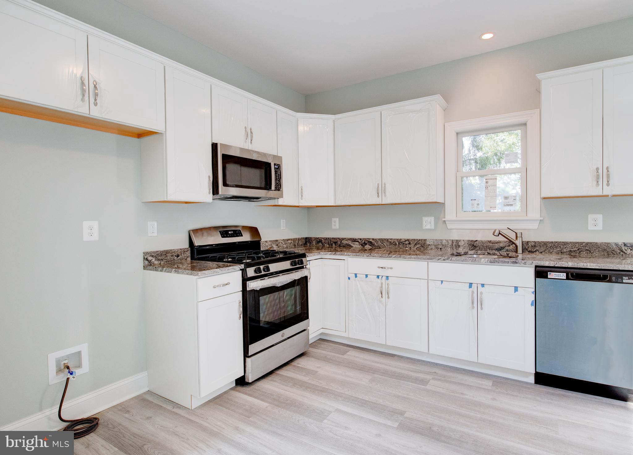 720 Kuser Road Hamilton, NJ 08619 - Photo 11 of 24 Kitchen w/granite counters & s/s appliances