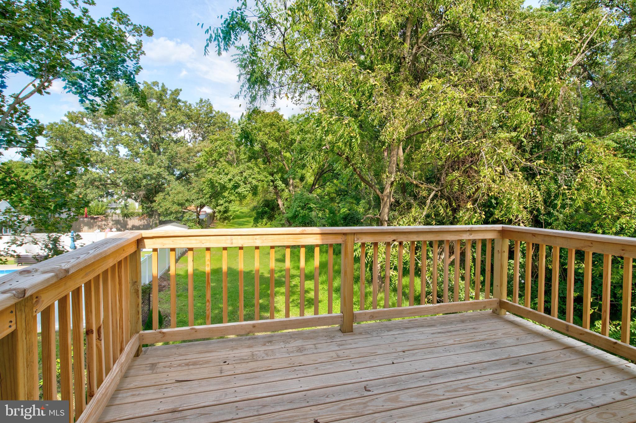 720 Kuser Road Hamilton, NJ 08619 - Photo 15 of 24 Deck off great room peaceful setting