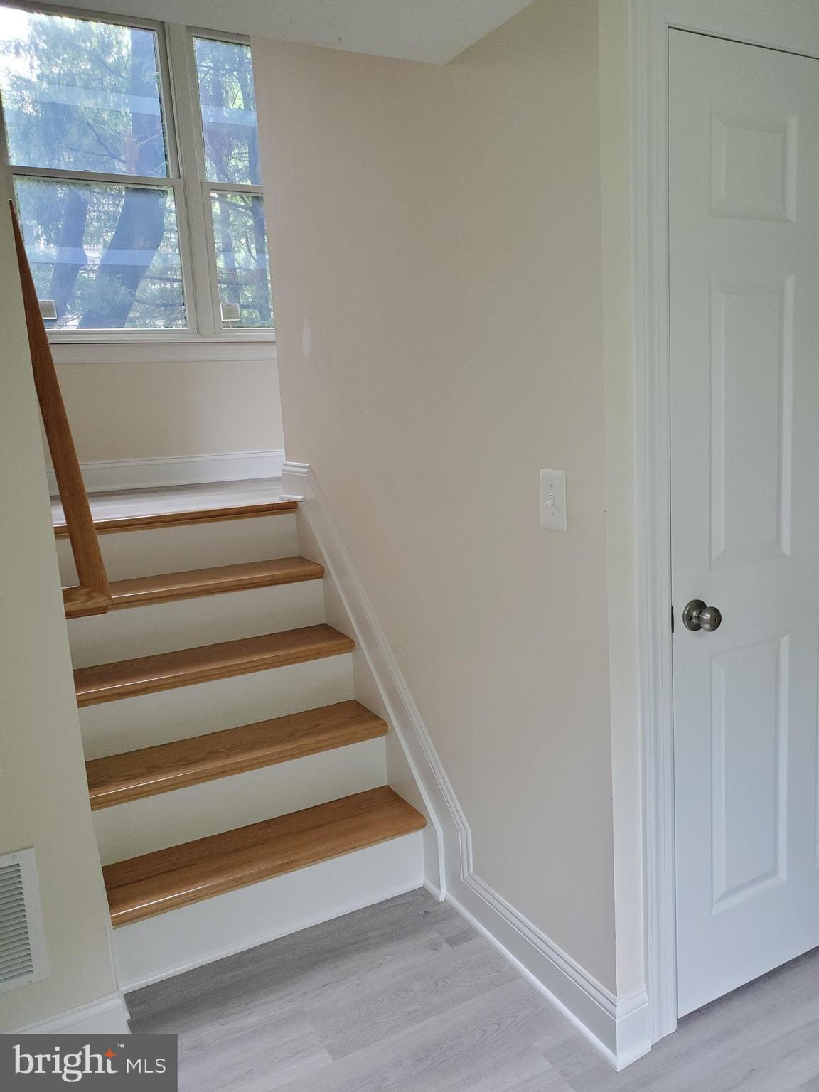 720 Kuser Road Hamilton, NJ 08619 - Photo 4 of 24 1st fl foyer to main level, oak steps, door - bsmt