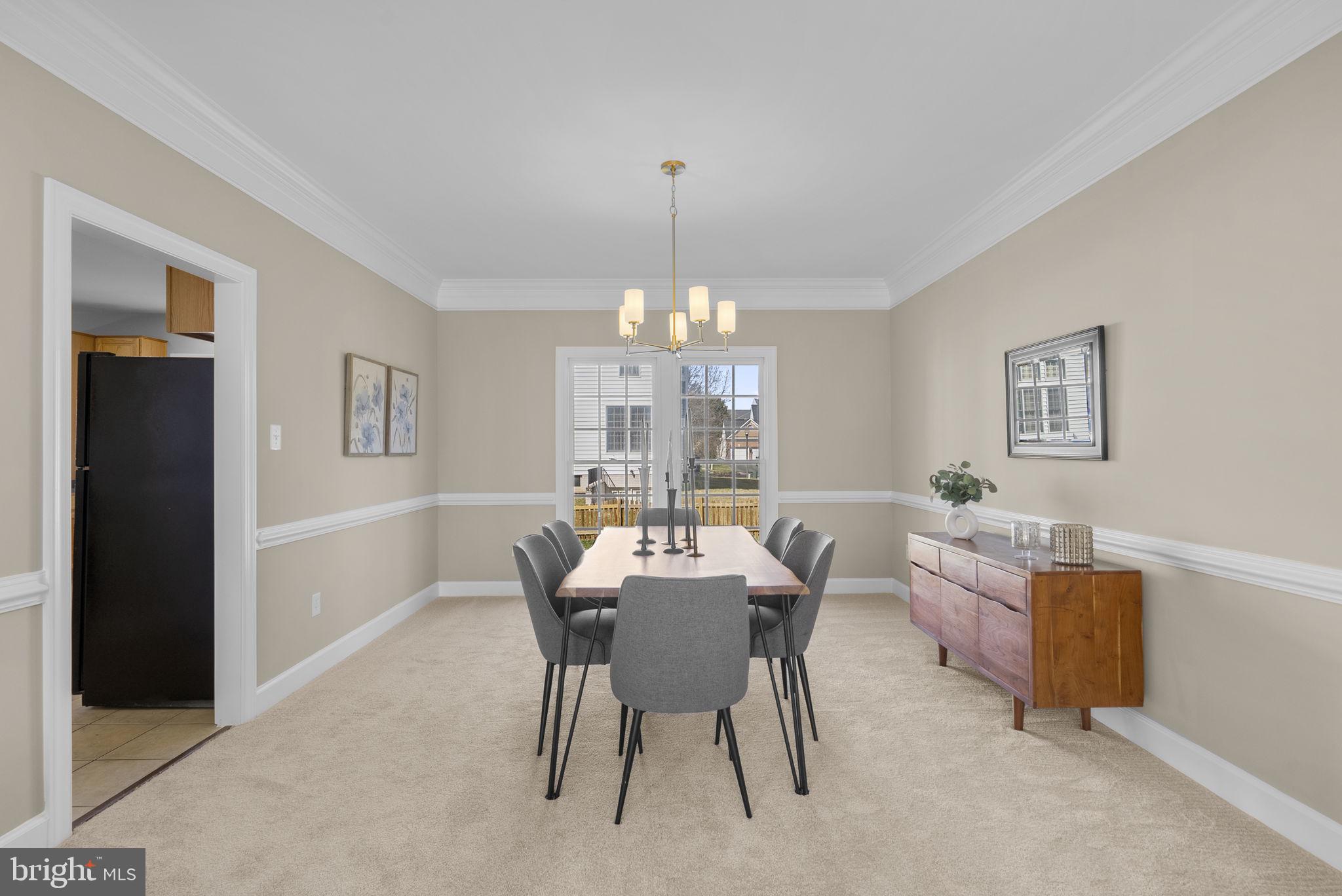 14421 Ashleigh Greene Road Boyds, MD 20841 - Photo 11 of 95 a dining room with furniture and window