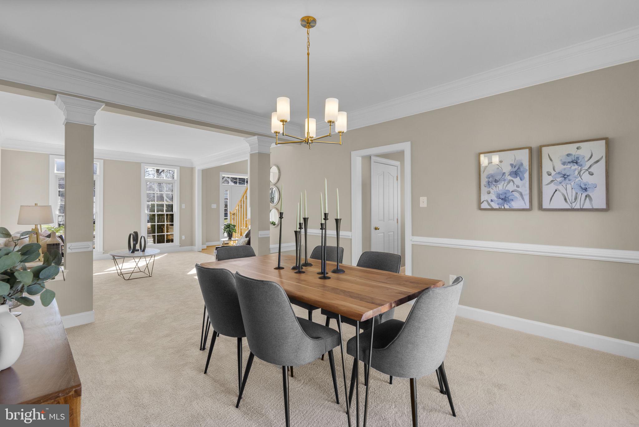 14421 Ashleigh Greene Road Boyds, MD 20841 - Photo 13 of 95 a view of a dining room with furniture and wooden floor