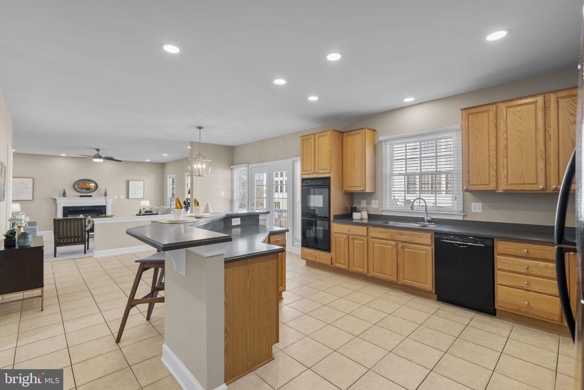 14421 Ashleigh Greene Road Boyds, MD 20841 - Photo 15 of 95 Huge Kitchen with Breakfast Bar Island